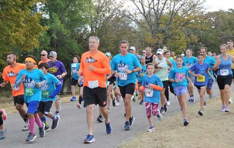Photo 2 of Run the Streets Woolaroc 8K.