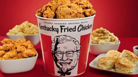 Bucket of crispy chicken, coleslaw, mashed potatoes and biscuits