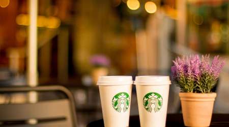 2 Starbucks drink on bistro table