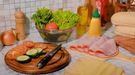 Meat & cheese slices, bread, lettuce & tomato