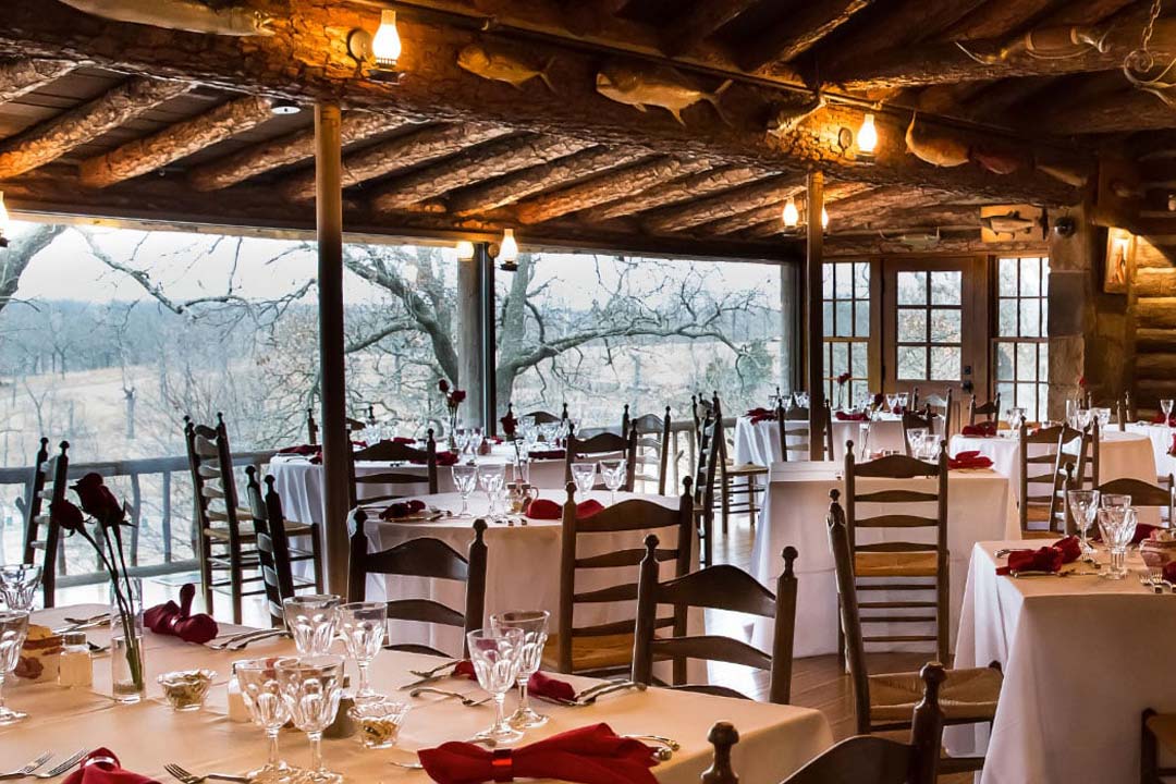 Woolaroc Lodge Dining tables set at the Woolaroc Lodge